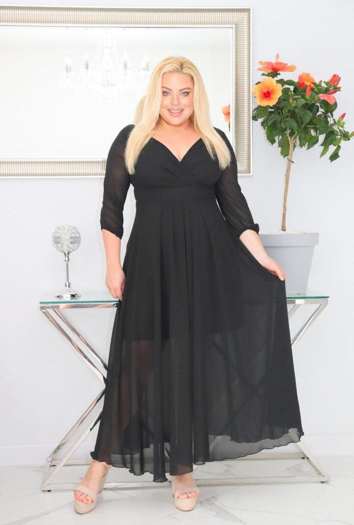 Sukienka Milos pięknie modelująca sylwetkę! Kopertowy dekolt wysmukla dekolt i szyję. Czarna.